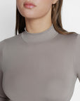 Sara Seamless Long-Sleeve Mock Neck Bodysuit – White Stretch Fit