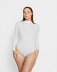 Sara Seamless Long-Sleeve Mock Neck Bodysuit – White Stretch Fit